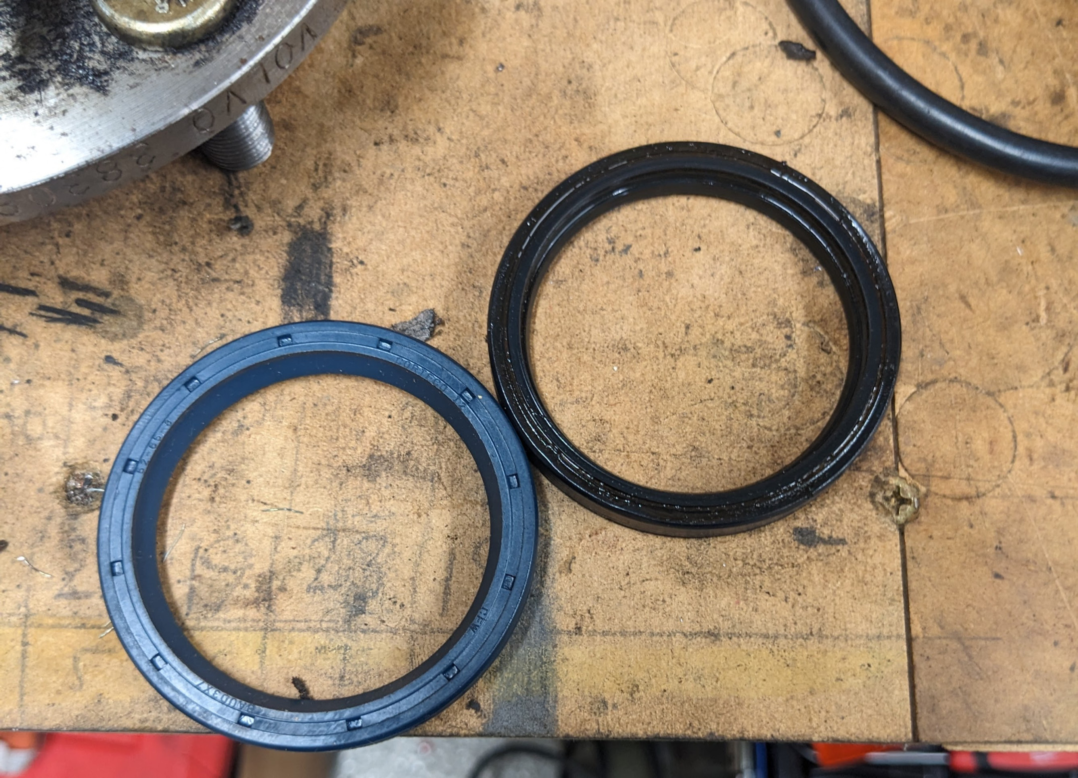 Volvo 240 inner axle seal old and new